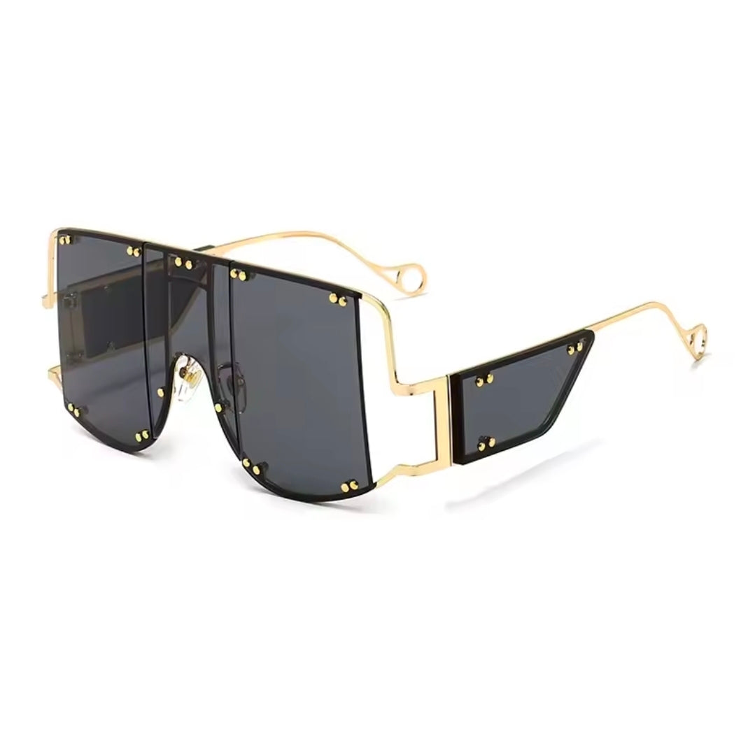 Stylish sunglasses featuring gold accents, embodying Imperfection Stunna H fashion.