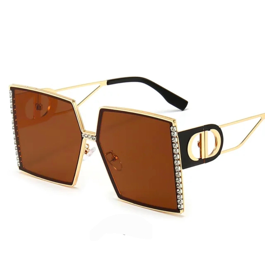 Imperfection Vibes Sunglasses with oversized brown lenses and stylish rhinestone embellishments.